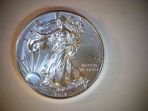 2012 SILVER EAGLE COIN,  COMES IN  AIR-TITE COIN CAPSULE - Picture 1 of 2