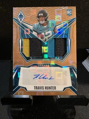 2025 Panini Phoenix Travis Hunter Rookie Dual Patch Auto /199 # DRP-THR - Image 1 of 2