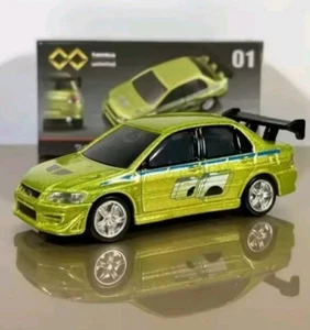 TAKARA TOMY MITSUBISHI LANCER EVO SCALE 1:64 MODEL CAR 01 COLLECTION RACING AUTO - Foto 1 di 1