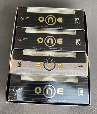 *NUEVO* Pelotas de golf Nike ONE negras TW Tiger Woods - 1 docena (12) caja plateada Foto 1 de 4
