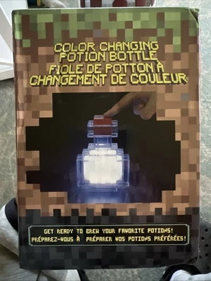Botella de poción que cambia de color Foto 1 de 2