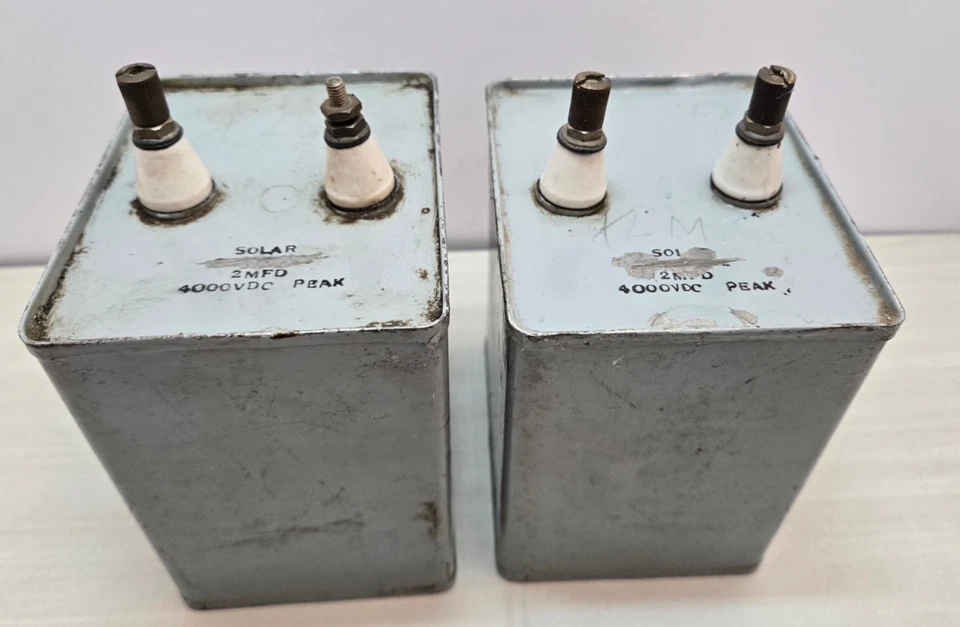 Lote de (2) condensador grande solar vintage lleno de aceite 2MFD 4000 VDC pico Foto 1 de 4