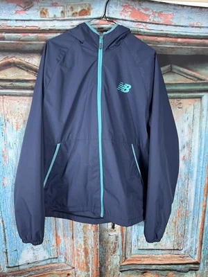 Cortavientos New Balance para hombre nuevo sin etiquetas ligero con capucha resistente al agua cremallera completa Foto 1 de 4