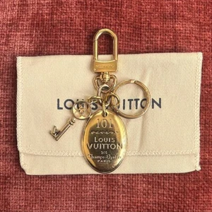 LOUIS VUITTON 101 CHAMPS ELYSEES MAISON Bag Charm Gold - Picture 1 of 8