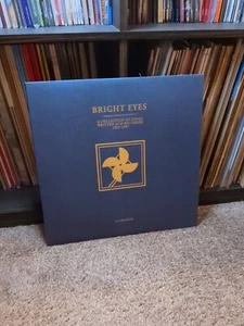 BRIGHT EYES - A Collection Of Songs... A Companion / New Limited Gold Vinyl LP - Bild 1 von 2