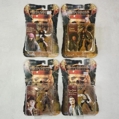Lote (4) Piratas del Caribe Jack Sparrow Turner Elizabeth Barbossa NUEVO Foto 1 de 4