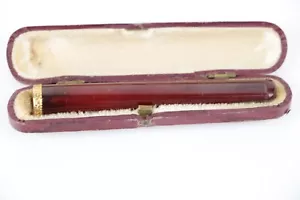Ein 14K Gold Bernstein Zigarettenhalter - Bild 1 von 9