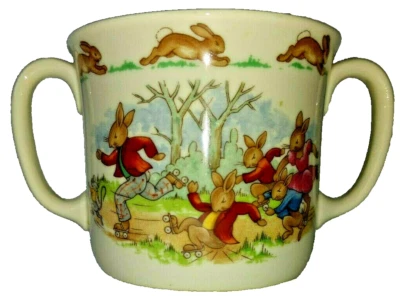 Royal Doulton Bunnykin Family Roller Skating 1936 Baby Gift Double Handled Mug - Image 1 of 4
