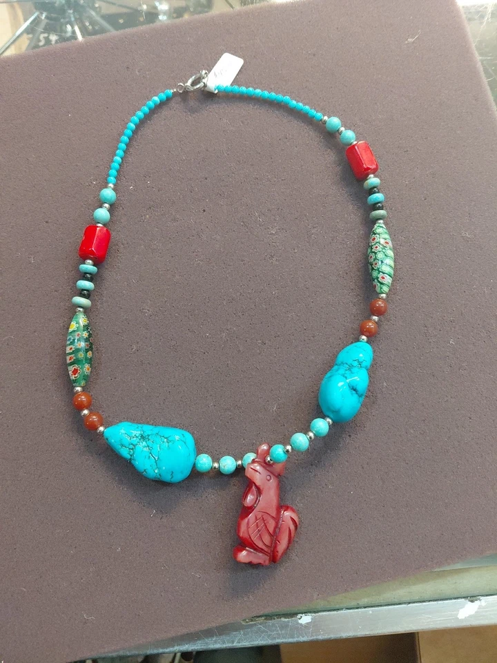 Beautiful  lturquoise and red bead necklace with a carved rooster pendant. - Image 1 of 4