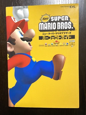 New Super Mario Bros. Perfect Guide Book 2006 Nintendo DS guía de estrategia Foto 1 de 4