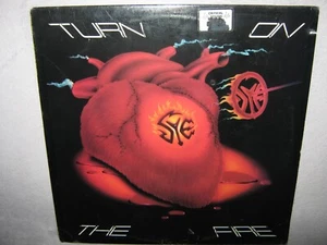 SYE Turn On The Fire ORIGINAL SEALED New Vinyl LP 1985 Enigma 72018-1 co creases - Picture 1 of 6