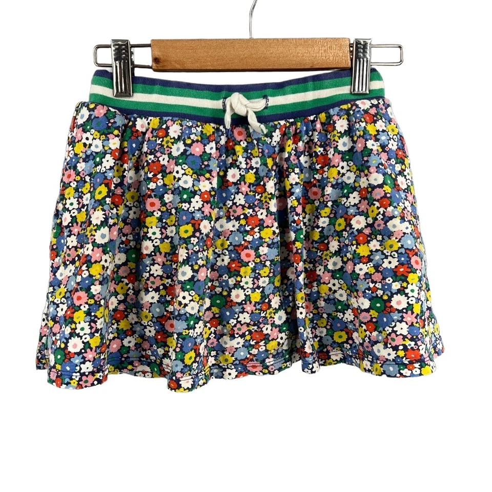 Saia Boden infantil azul floral cordão cintura shorts por baixo malha 7/8Y - Imagem 1 de 4