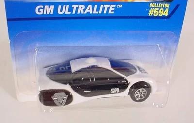 HOT WHEELS COLLECTOR # 594 GM ULTRALITE W/ TAMPOS & 7SP - Image 1 of 2