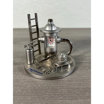 Silver Metal Fireman Equipment Desk Collectable Clock- Excellent Condition - Image 1 of 4