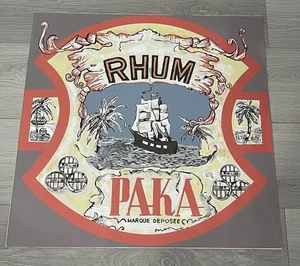 Poster pubblicitario vintage in feltro alcolico e grana di ciottoli ecopelle RHUM PAKA 27”x27” - Foto 1 di 7