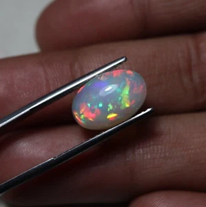 Ópalo blanco etíope fuego multi llamativo natural forma ovalada de 4,7 quilates 14,5 x 9,6 mm - Imagen 1 de 14
