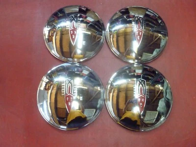 DE COLECCIÓN NOS 1941-42 OLDSMOBILE SERIE 90 PLATO PERRO POBREZA TAPACUBOS CUBIERTAS DE RUEDA Foto 1 de 4