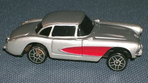 MAISTO 1957 CHEVROLET CORVETTE 1:64 SILVER AND RED! - Picture 1 of 6