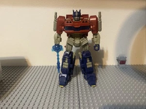 Transformers One Deluxe Optimus Prime gebraucht unvollständig - Bild 1 von 4