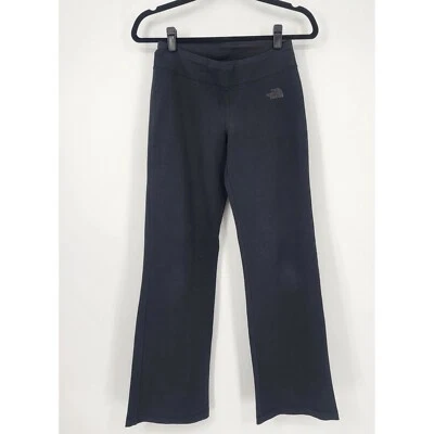 Pantalones de yoga The North Face para mujer talla pequeña acampanados corte boot negro tejido atletismo Foto 1 de 4