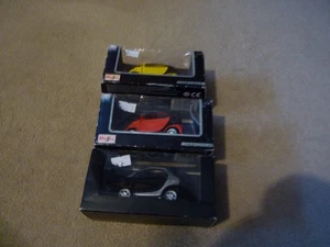 3x Maisto Pull Back Smart Cars - Originalverpackt 1:33 - Bild 1 von 3