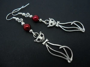 A PAIR OF TIBETAN SILVER  AND RED  BEAD CAT EARRINGS. NEW. - Picture 1 of 1