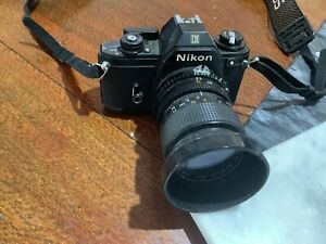 Nikon EM 35mm SLR Film Camera Fitted With Cosina 35-70mm Lens