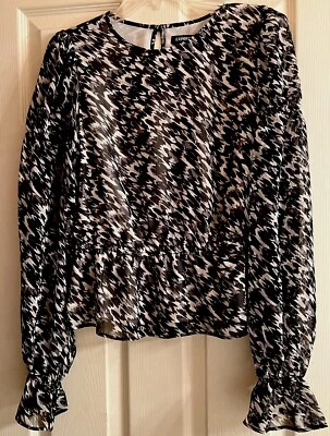 Blusa para mujer EXPRESS negra tostada con volantes manga larga transparente precio de venta sugerido por el fabricante: $58 talla S Foto 1 de 4