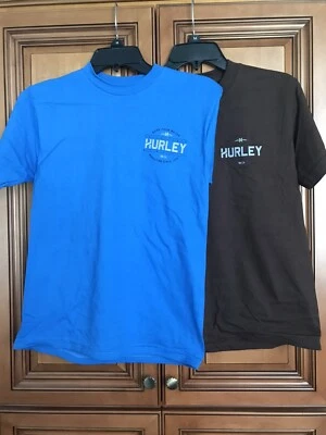 Two New Bl/Br Hurley Kids Orange & Brown HB/CA Graphic T-Shirts Size M X2 Set - Image 1 of 4