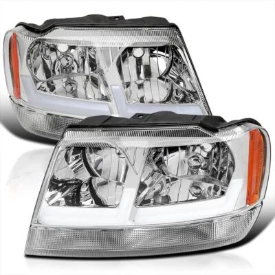 Faros de carcasa cromados con barra de luz de tubo LED para Jeep Grand Cherokee 1999-2004 Foto 1 de 4