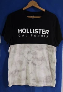 Camiseta Hollister de dos tonos talla grande para hombre. Parte superior negra mitad y mármol blanco y gris - Imagen 1 de 6