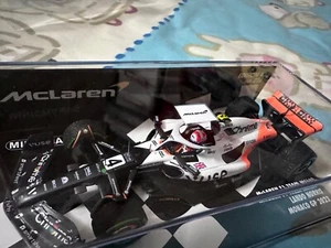 Minichamps 1:43 McLaren F1 MCL60 F1 Triple Crown Monaco GP 2023 Lando Norris NEW - Picture 1 of 11