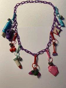 VINTAGE Retro 1980’S BELL CHARM Purple NECKLACE WITH 9 80’S PLASTIC CHARMS - Picture 1 of 8