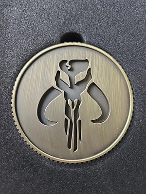 Disney Star Wars Mandalorian Boba Fett Mythosaur Skull Coin 2" Metal Brass Tone - Image 1 of 2