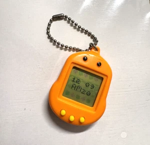 Vintage orange virtual pet electronic toy circa 1997 - Picture 1 of 5