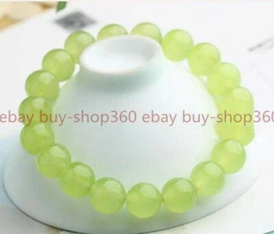 Natural 10mm Green Peridot Gemstone Round Beads Stretch Bracelet 7.5'' AAA+ - Image 1 of 4