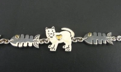Pulsera de hueso de pez gato esterlina México broche de corazón plata oro acento Vermeil Foto 1 de 4