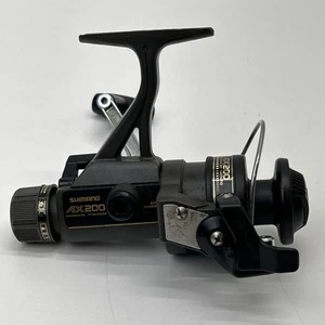 Shimano AX 200 Spinning Reel Quickfire 2 Bottom Fighting Drag - Picture 1 of 14