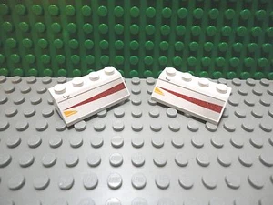 Lego 2 White 2x4 slope printed design - Picture 1 of 1