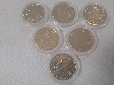 13 Uncirculated Encapsulated State Quarters, 6 Gold Plated, 7 Not - Image 1 of 4