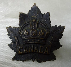 A GOOD WW1 CEF CANADIAN MAPLE LEAF 'CANADA' CAP BADGE. SLIDER. OXYDISED FINISH. - Imagen 1 de 5