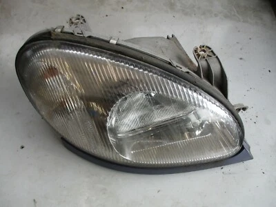 DAEWOO LANOS OSF DRIVER SIDE HEADLIGHT HEAD LAMP FRONT RIGHT WITH TRIM - Image 1 of 2