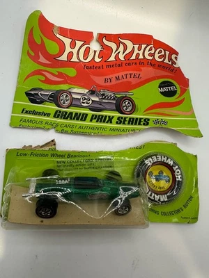 De colección 1969 Hot Wheels Redlines Green Indy Eagle nuevo en tarjeta original dividido en 2 Foto 1 de 4