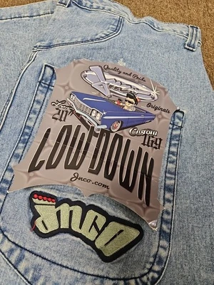 NUEVO CON ETIQUETAS JNCO Pantalones de mezclilla bajos bordados para hombre 42x32 pierna ancha holgados Foto 1 de 4