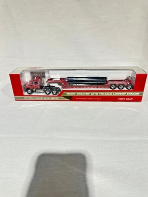 Red Mack Granite w/ Lowboy Trailer & Tube Load By First Gear 1/64th Scale - Image 1 of 4