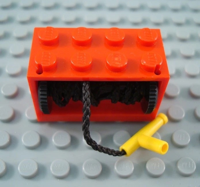 LEGO Red 2x4x2 String Reel Drum with Yellow Nozzle - Image 1 of 1