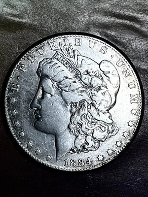 1884 CC  MORGAN DOLLAR  NICE FINE RARE DOLLAR - Image 1 of 4