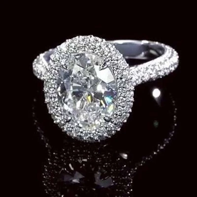 Anillo de compromiso de tres piedras de moissanita D corte redondo de 3 quilates enchapado en oro rosa de 14 k Foto 1 de 4