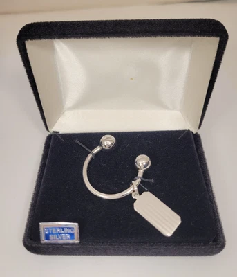 Llavero/cadena de plata de ley con dije, forma de herradura, marcas de abolladuras en 1 extremo Foto 1 de 4