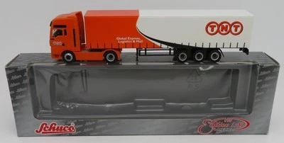 Schuco Ho 1/87 Camion Man TGA Rimorchio tnt Global Rxpress Logistics & Mail - Immagine 1 di 4